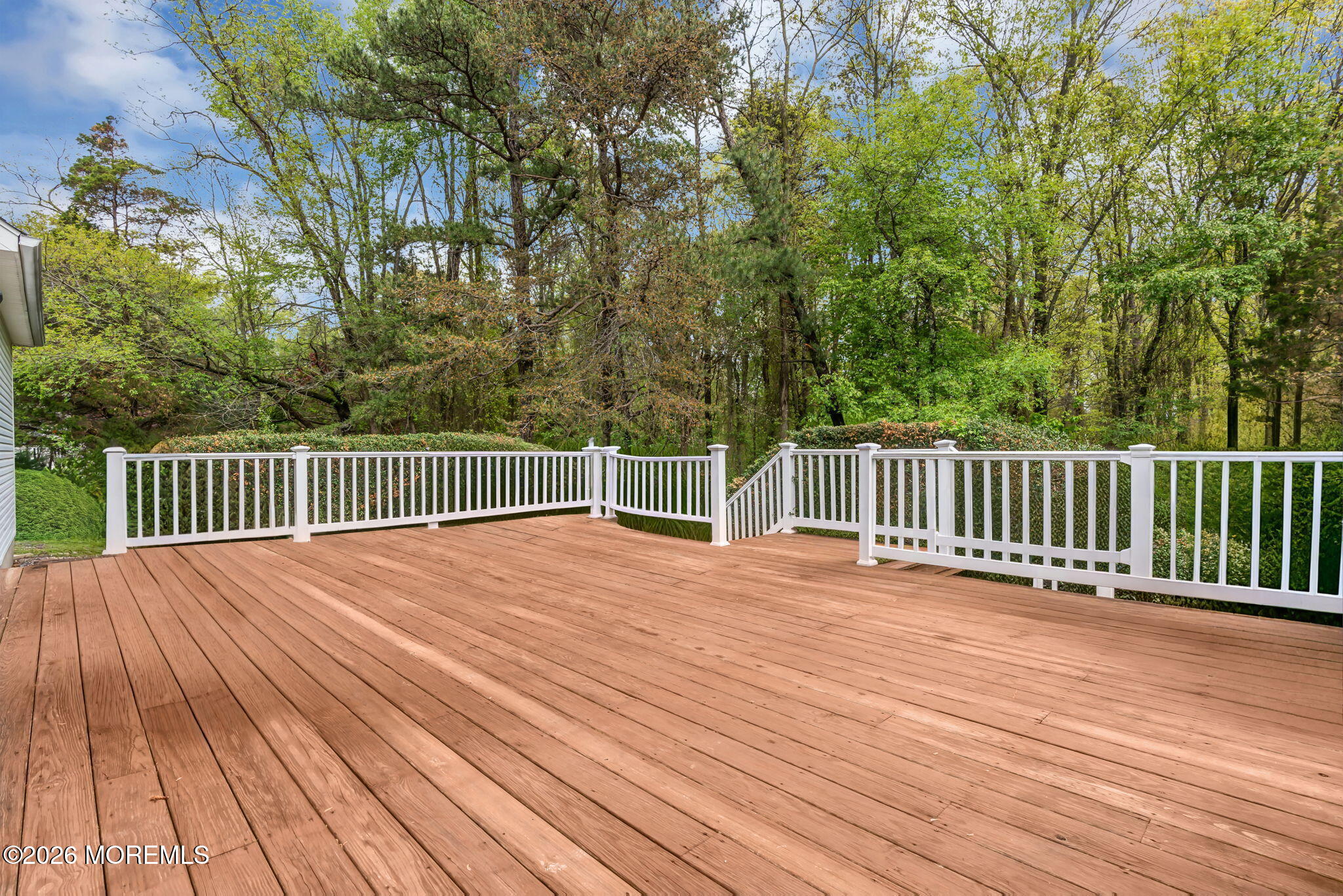 4 Quaker Hill Road Jackson, NJ 08527 - Photo 59 of 70 a view of a deck and a yard with wooden fence