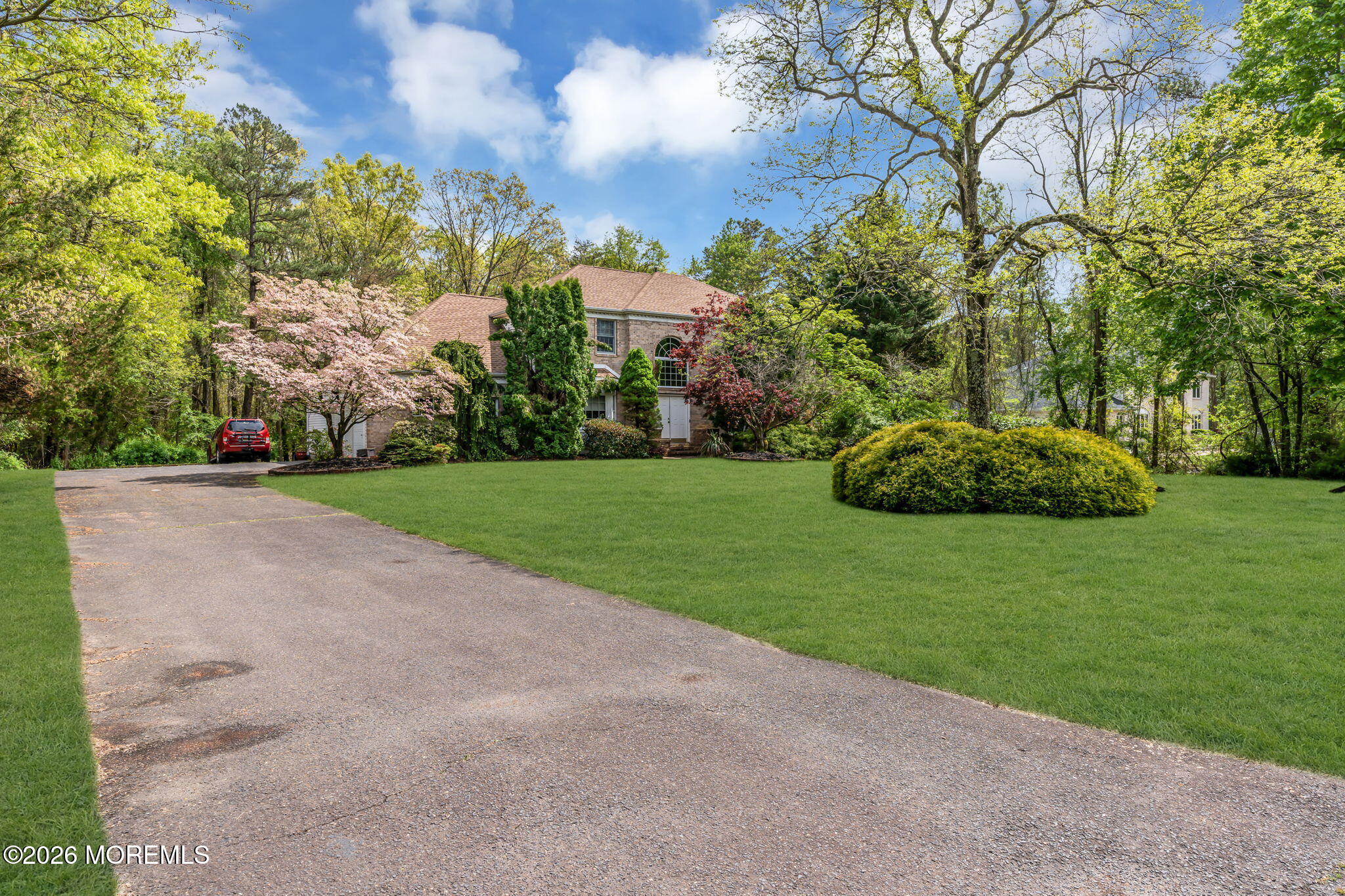 4 Quaker Hill Road Jackson, NJ 08527 - Photo 8 of 70 a view of a garden with large trees