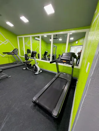 a view of a room with gym equipment