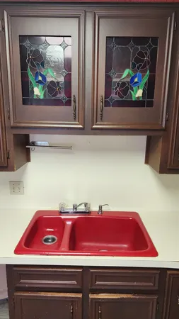 a view of kitchen and microwave