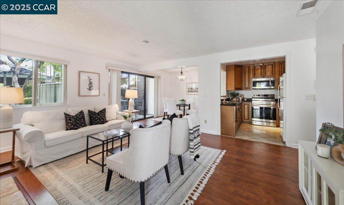 108 Compton Circle, Unit D San Ramon, CA 94583 - Photo 1 of 1 a living room with furniture and a window