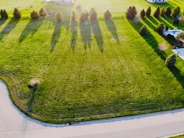 a view of swimming pool from a lake