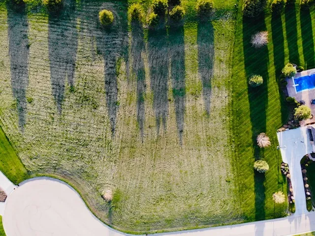 a bathroom with a shower and toilet