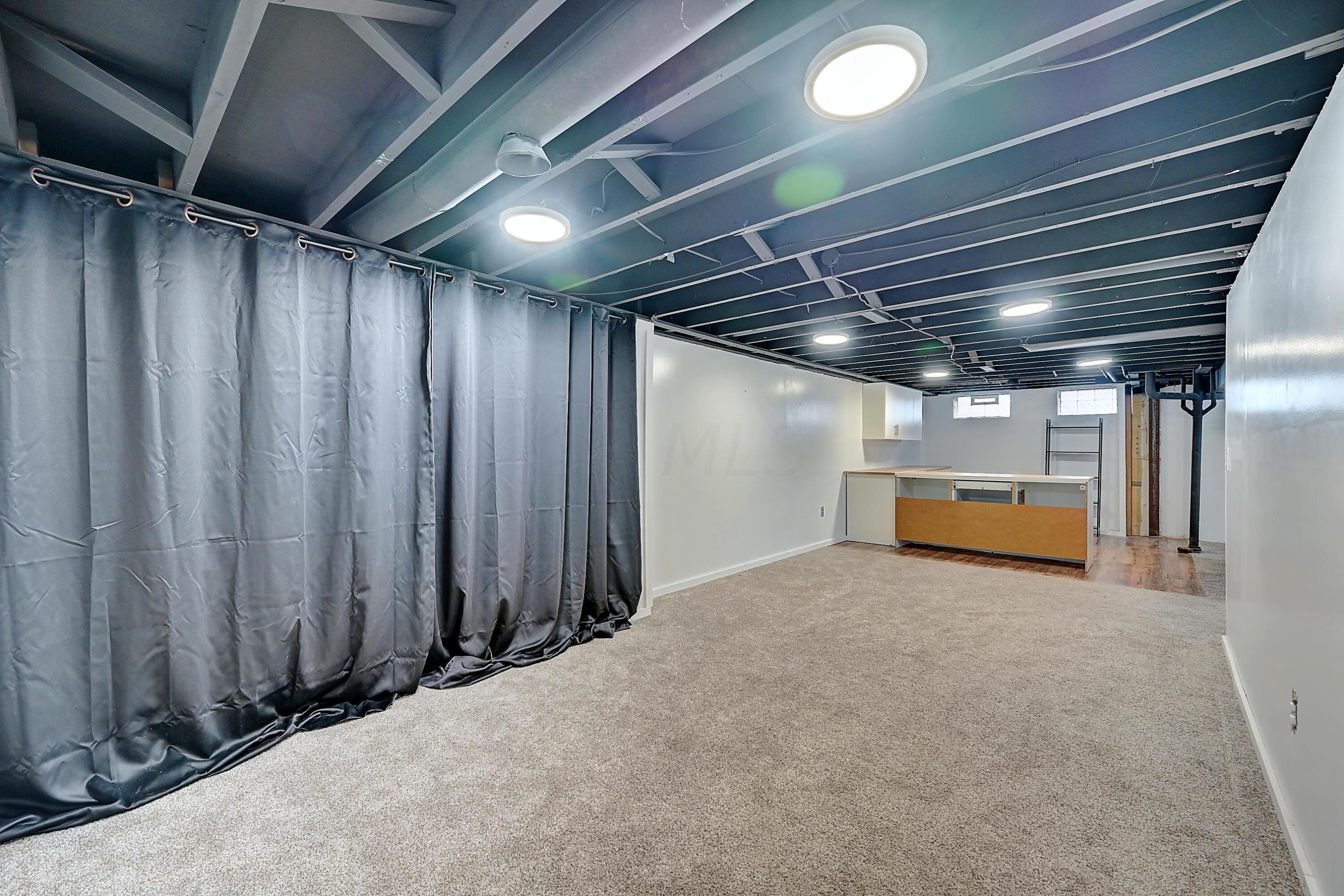 5594 Norcross Road Columbus, OH 43229 - Photo 21 of 33 Basement entertaining area