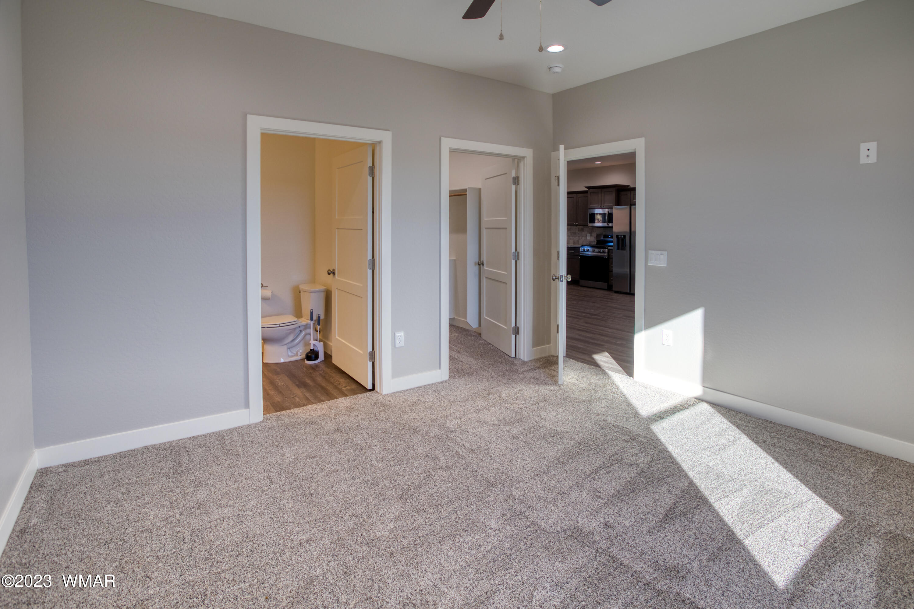 260 Granite Circle Taylor, AZ 85939 - Photo 8 of 11 a view of a big room with closet and windows