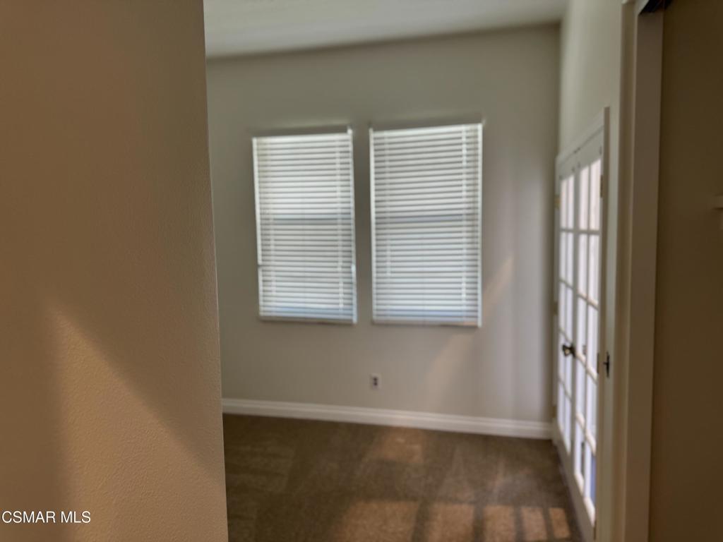 1604 Rose Arbor Lane Simi Valley, CA 93065 - Photo 10 of 16 a view of an empty room with a window