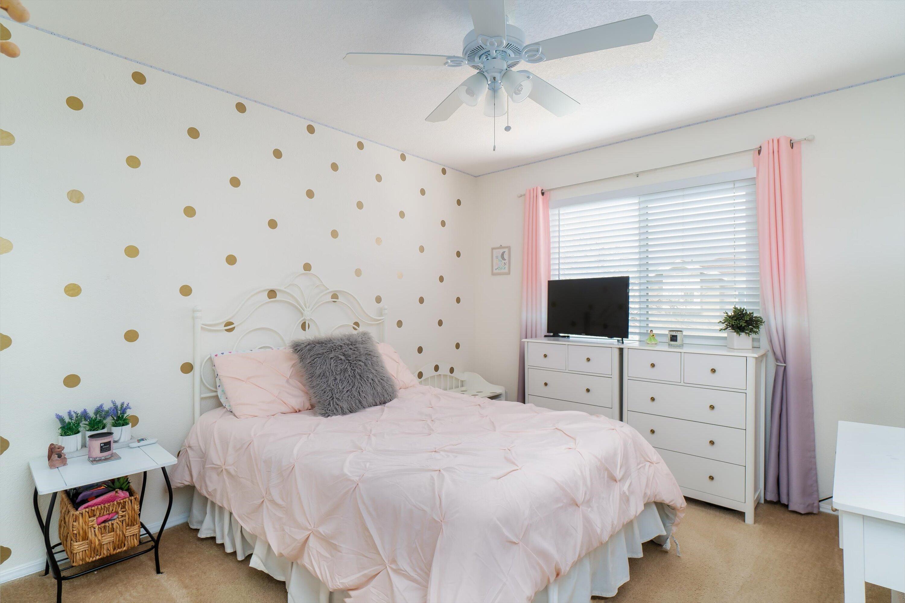 1337 Jason Drive Lompoc, CA 93436 - Photo 15 of 26 a bedroom with a bed and a flat screen tv
