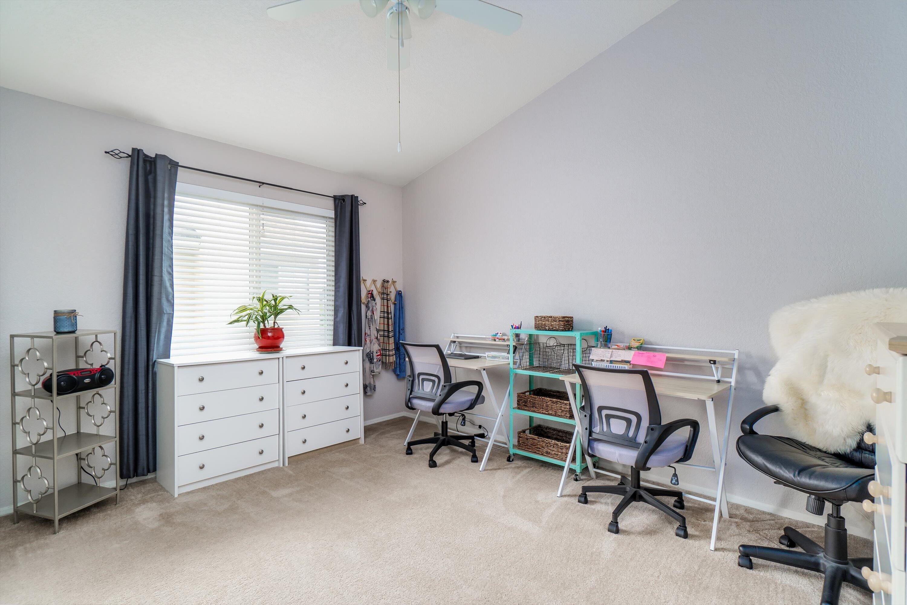 1337 Jason Drive Lompoc, CA 93436 - Photo 16 of 26 a view of a workspace with furniture and a window