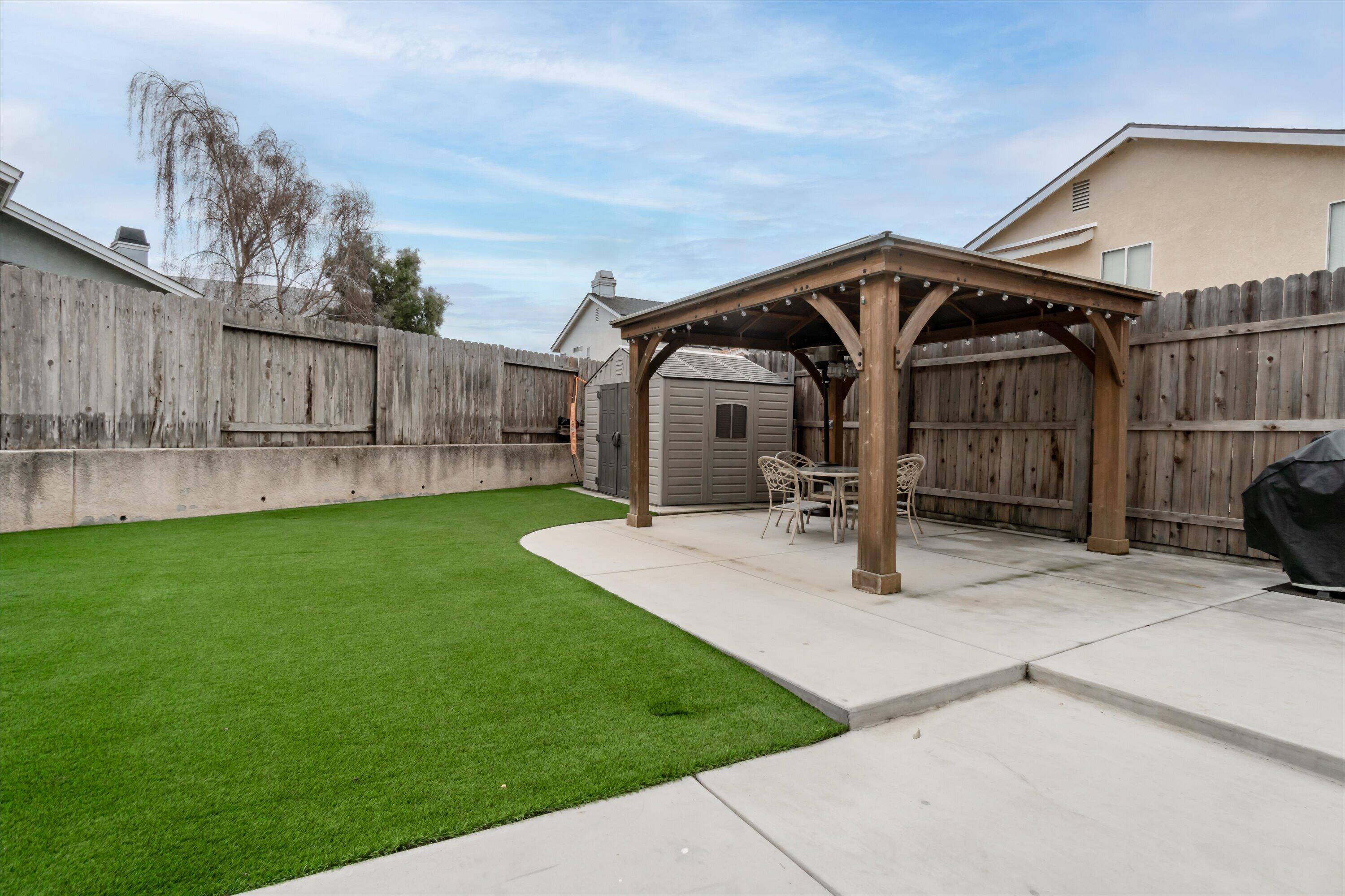 1337 Jason Drive Lompoc, CA 93436 - Photo 20 of 26 a view of a house with backyard and porch