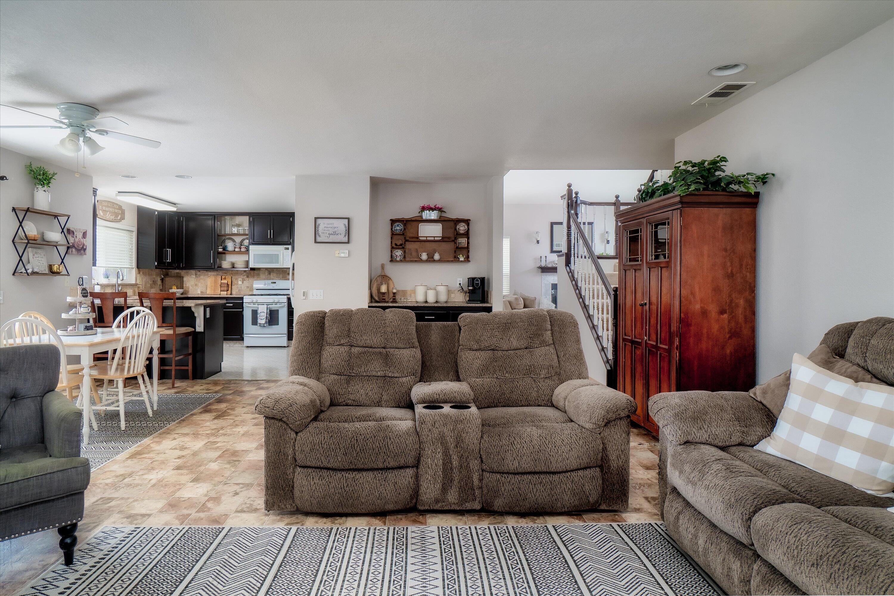 1337 Jason Drive Lompoc, CA 93436 - Photo 7 of 26 a living room with furniture and a fireplace