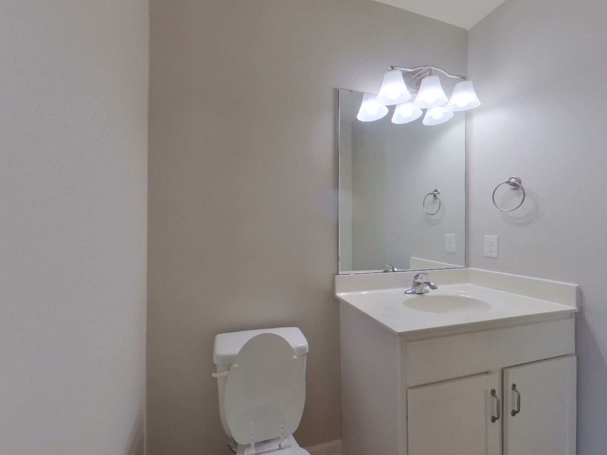 611 Prominence Road Columbia, TN 38401 - Photo 13 of 16 a bathroom with a toilet sink and mirror