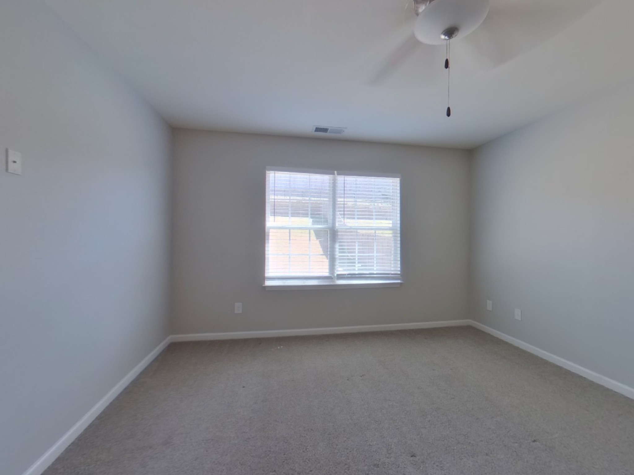 611 Prominence Road Columbia, TN 38401 - Photo 6 of 16 an empty room with a window