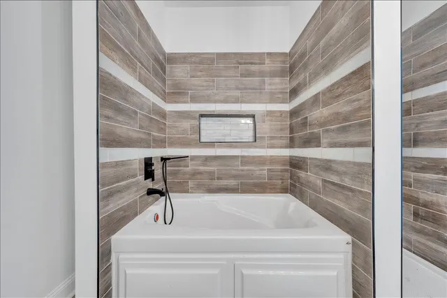 a bathroom with a bathtub