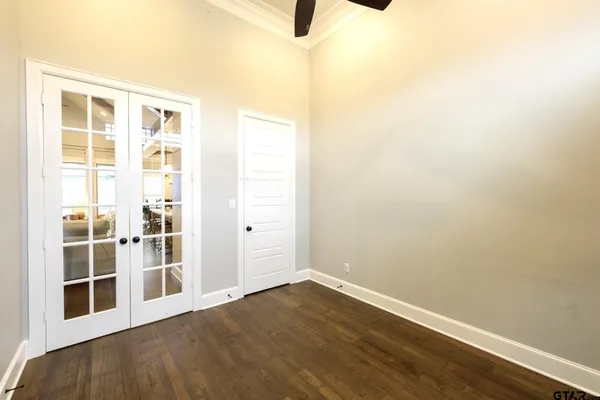 a view of an empty walk in closet