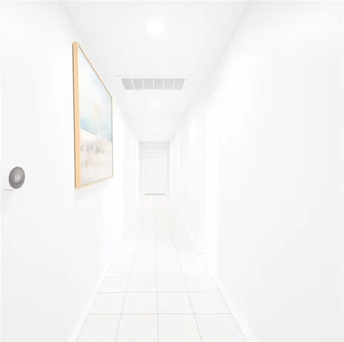 a picture of a bathroom with a mirror