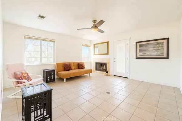 a living room with furniture and a couch