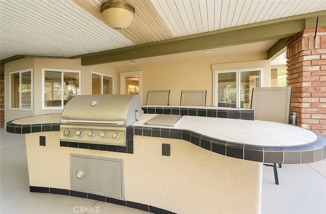 a house view with a outdoor space