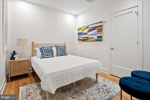 a bedroom with a bed and furniture