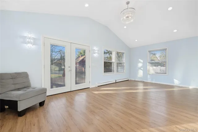 a view of livingroom with hardwood floor and window