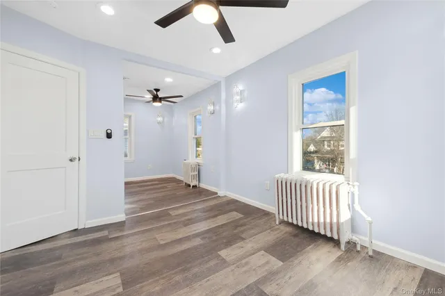 a view of an empty room and window