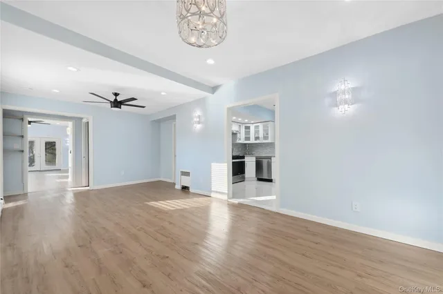 a view of a livingroom with wooden floor