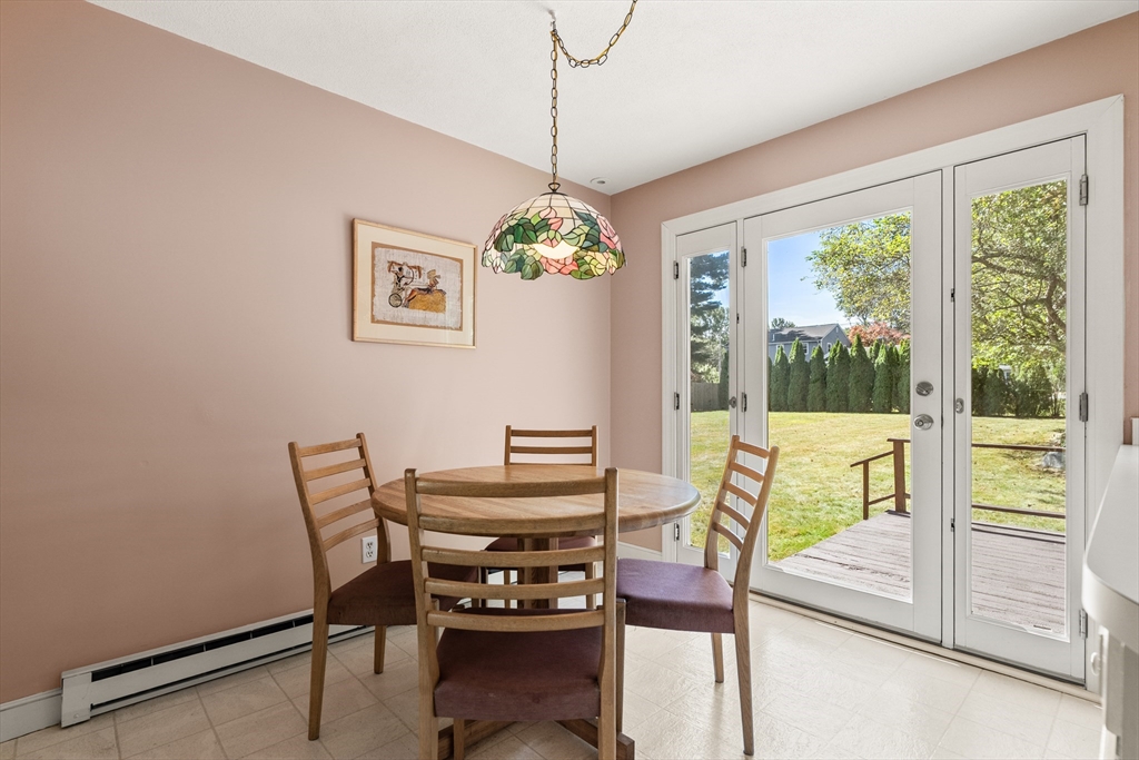 10 Idylwilde Road Lexington, MA 02421 - Photo 17 of 42 a view of a dining room with furniture window and outside view