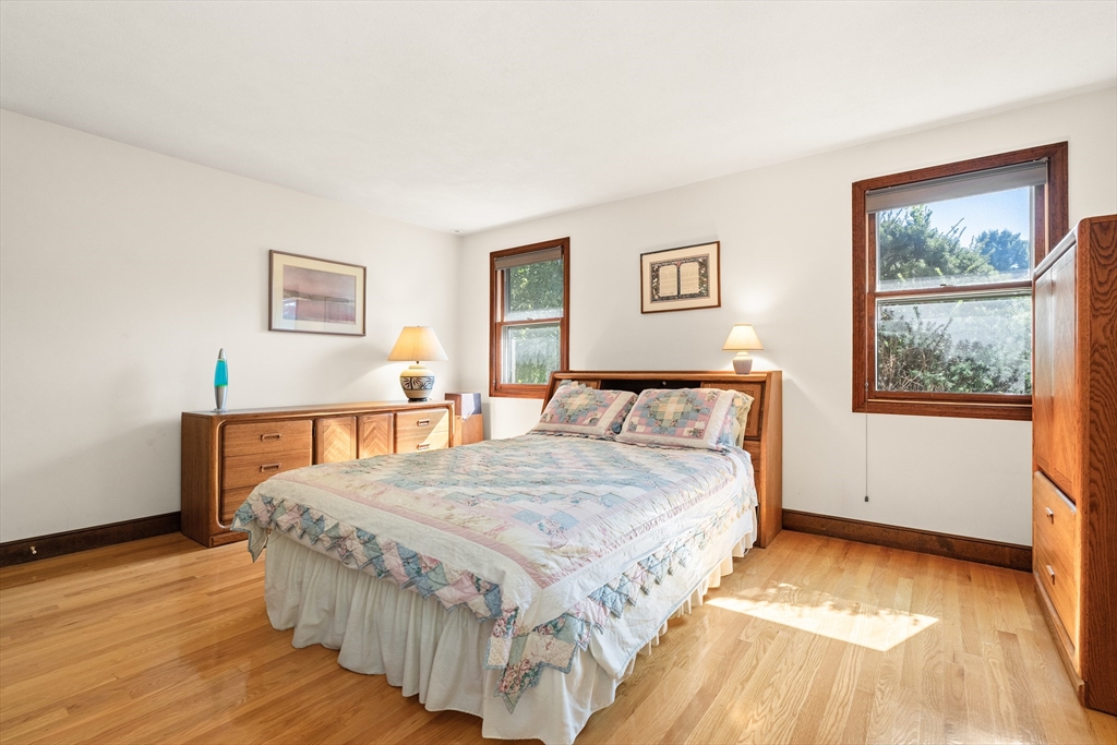 10 Idylwilde Road Lexington, MA 02421 - Photo 20 of 42 a bedroom with a bed and a night stand