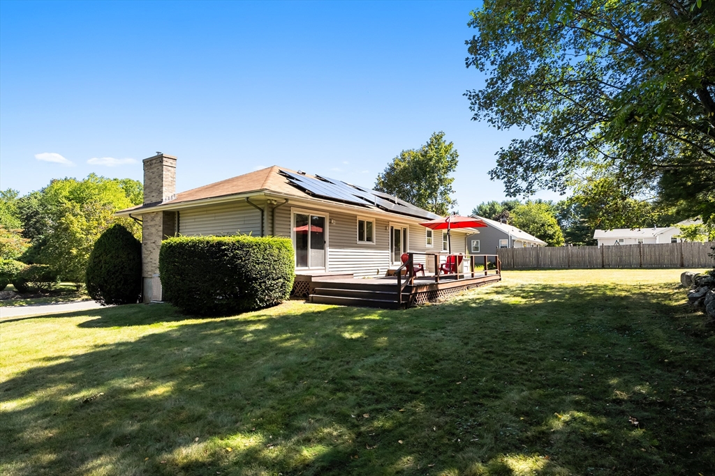 10 Idylwilde Road Lexington, MA 02421 - Photo 35 of 42 a front view of house with yard and trees