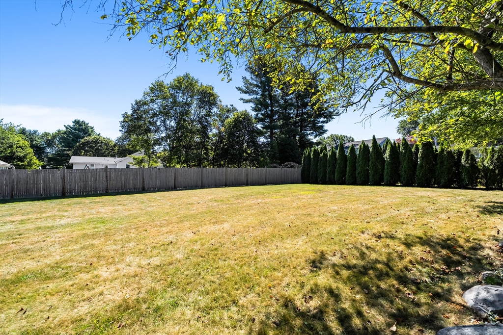 10 Idylwilde Road Lexington, MA 02421 - Photo 36 of 42 a swimming pool with wooden fence