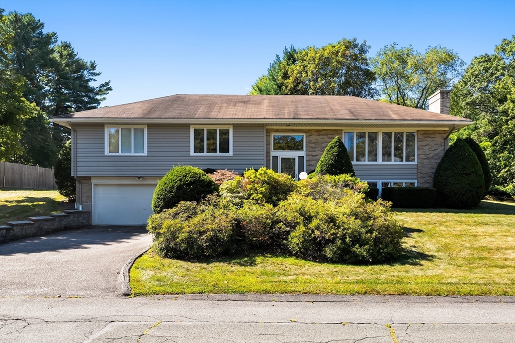 10 Idylwilde Road Lexington, MA 02421 - Photo 4 of 42 a view of a house with a yard