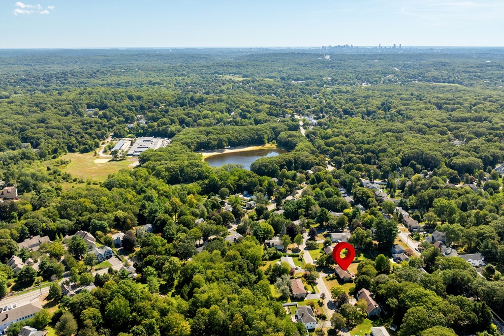 10 Idylwilde Road Lexington, MA 02421 - Photo 7 of 42 an aerial view of a houses with a lush green hillside