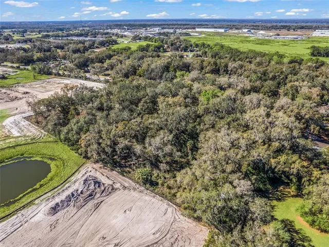 a view of a large body of water with a building in the background