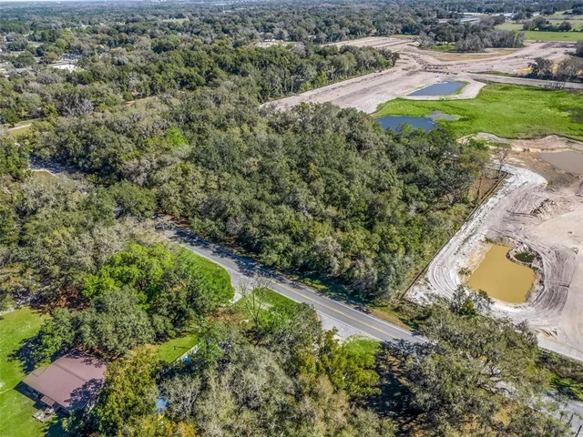 a view of a lake with a yard