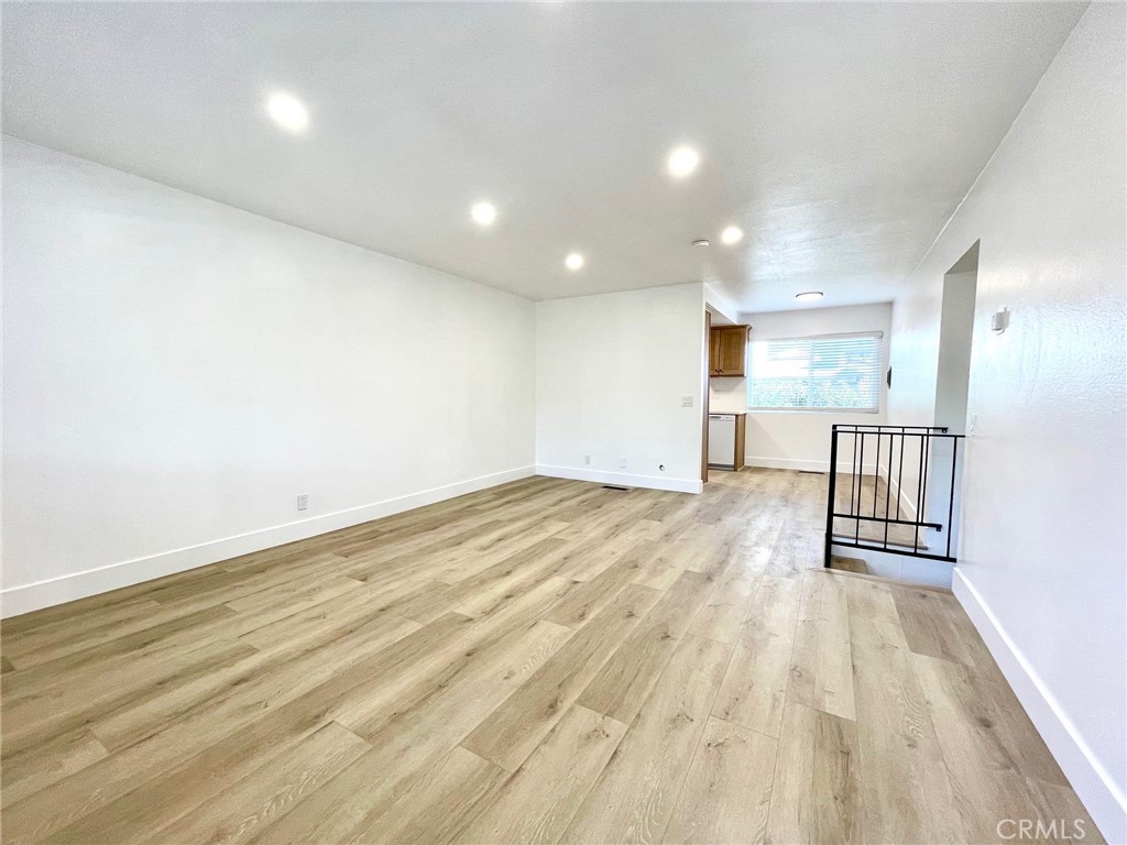 821 Calle Puente, Unit 3 San Clemente, CA 92672 - Photo 3 of 11 a view of empty room with wooden floor