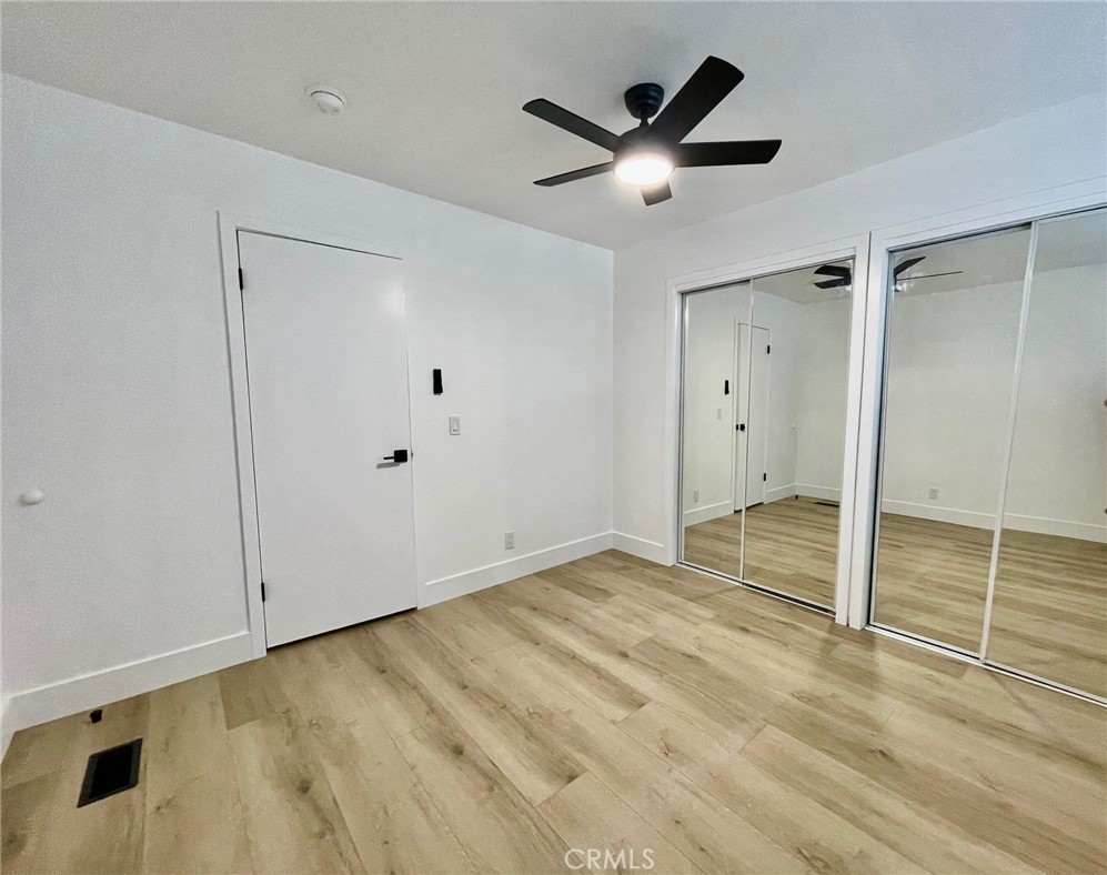 821 Calle Puente, Unit 3 San Clemente, CA 92672 - Photo 5 of 11 a view of a livingroom with wooden floor