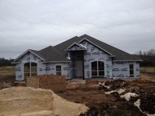 105 Adobe Cove Georgetown, TX 78633 - Photo 1 of 1 front view of a house with a yard