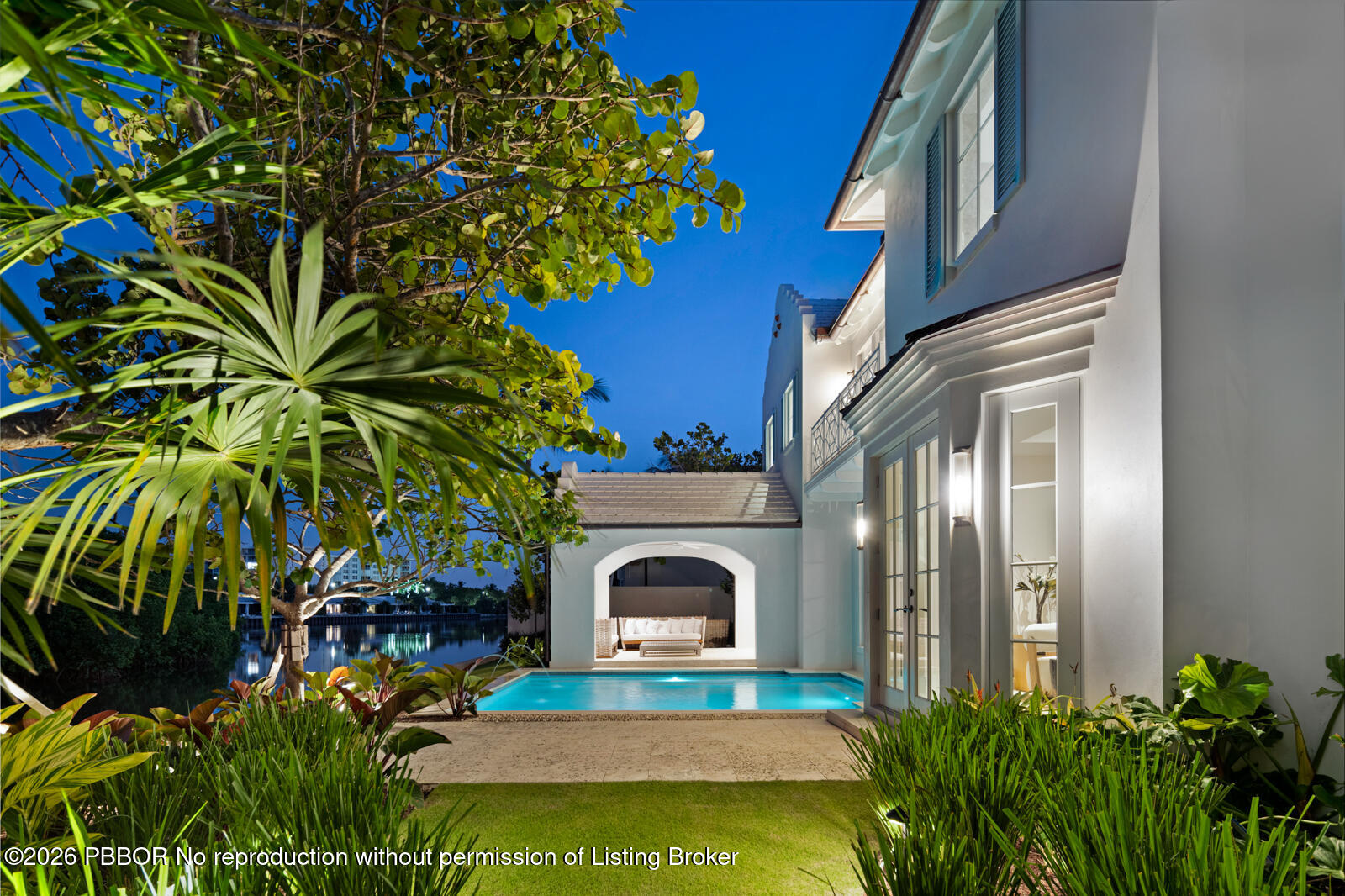 2219 Ibis Isle Road East Palm Beach, FL 33480 - Photo 50 of 64 Twilight Backyard