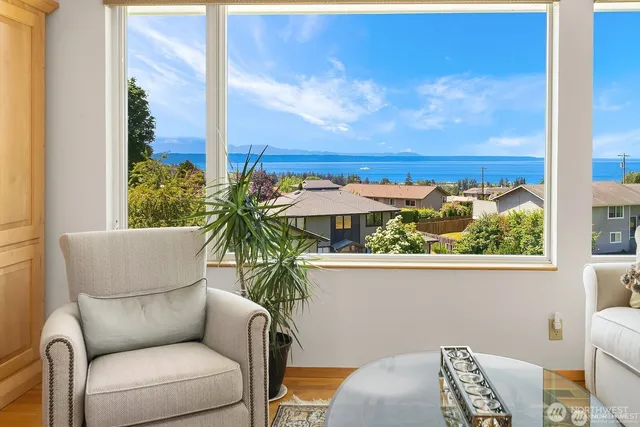 a view of balcony with furniture