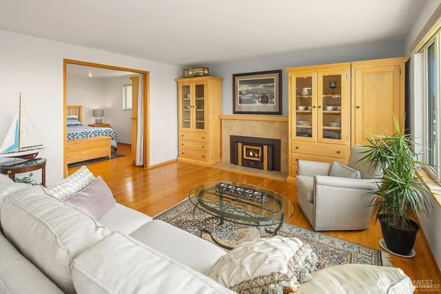 a bedroom with a bed and a couch