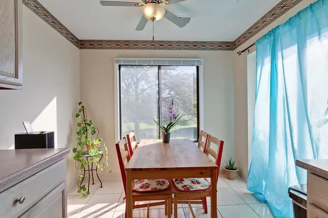 a bathroom with a sink toilet vanity and shower
