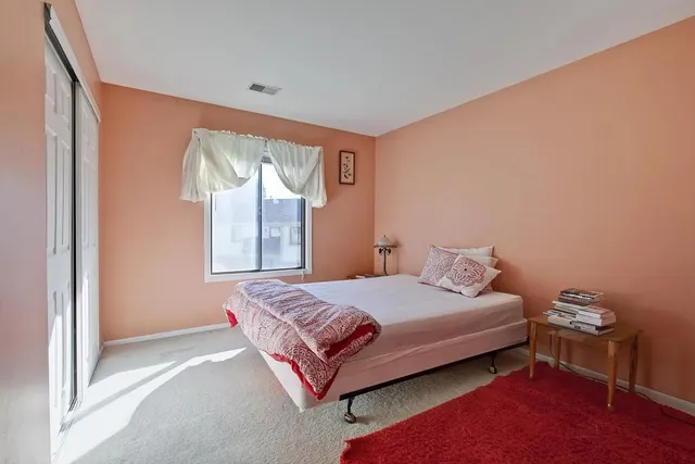 a living room with a fireplace