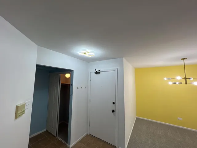 an empty room with a door