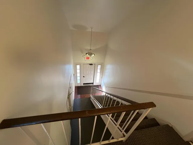 a view of balcony with wooden floor