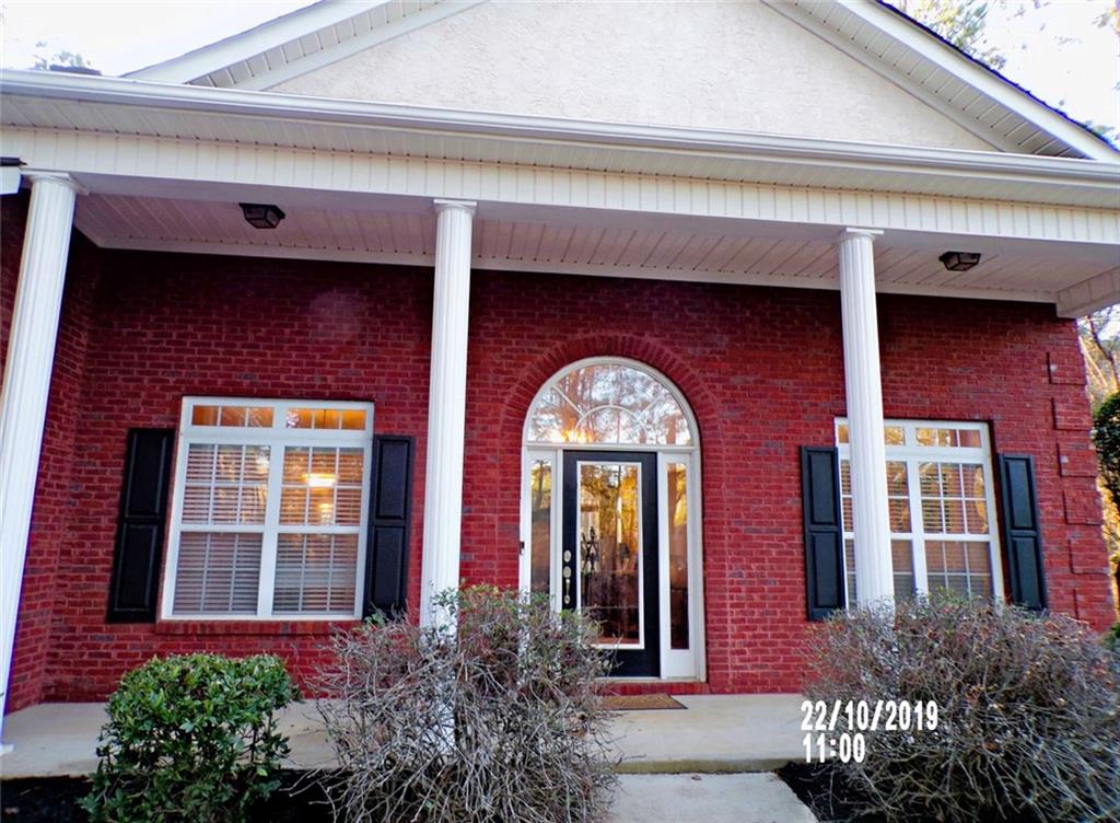 1035 Upchurch Road McDonough, GA 30252 - Photo 2 of 48 a front view of a house