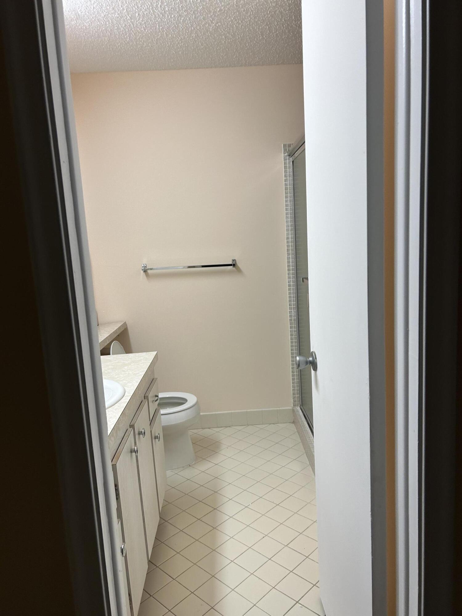 2003 Southwest 18th Street Boynton Beach, FL 33426 - Photo 5 of 11 a bathroom with a toilet