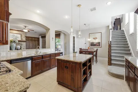 a view of a dining room with furniture and window