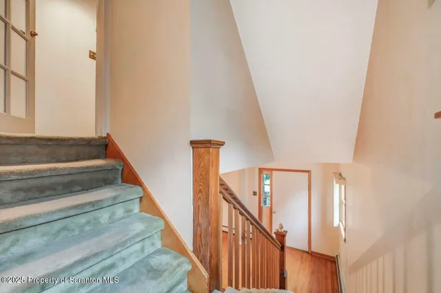 a bathroom with a toilet sink and shower