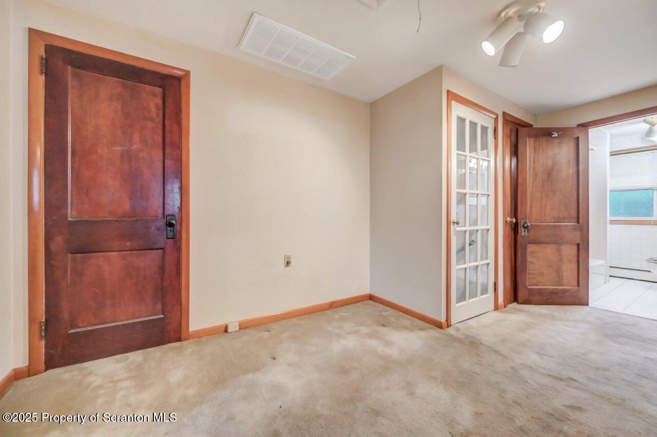 216 North Abington Road Clarks Green, PA 18411 - Photo 35 of 71 an empty room with closet and windows