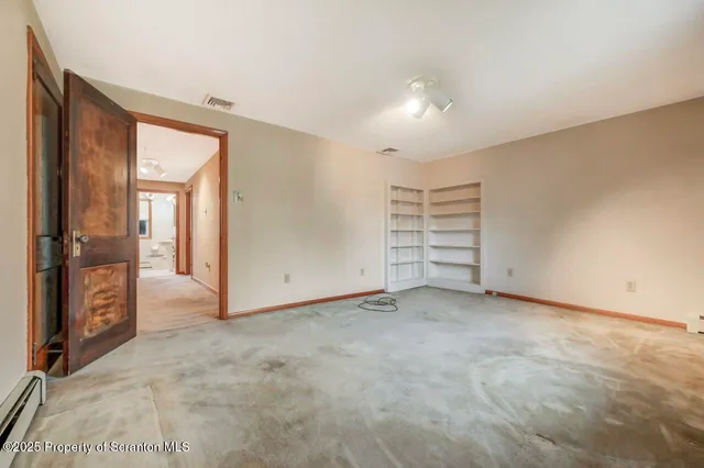 a view of storage and utility room