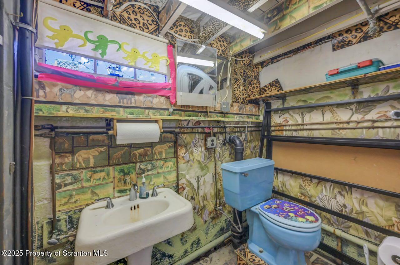 216 North Abington Road Clarks Green, PA 18411 - Photo 60 of 71 a bathroom with a toilet sink and mirror